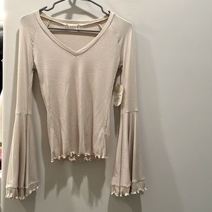 Cream long sleeve shirt